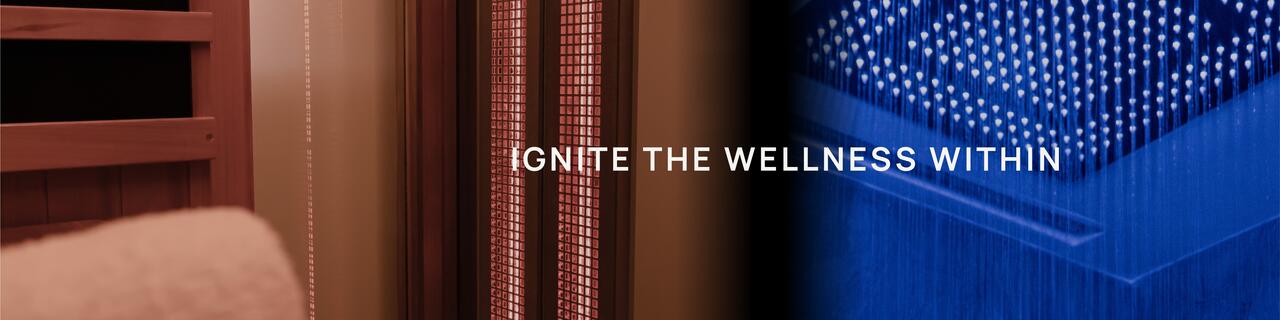 Infrared sauna suite and cold rainfall shower at a Perspire Sauna Studio.